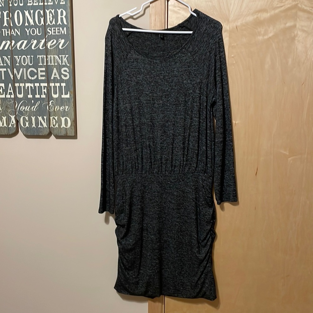 Long sleeve dress, tighter fitting bottom half